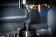 Close-up of CNC machine in action showcasing precision engineering